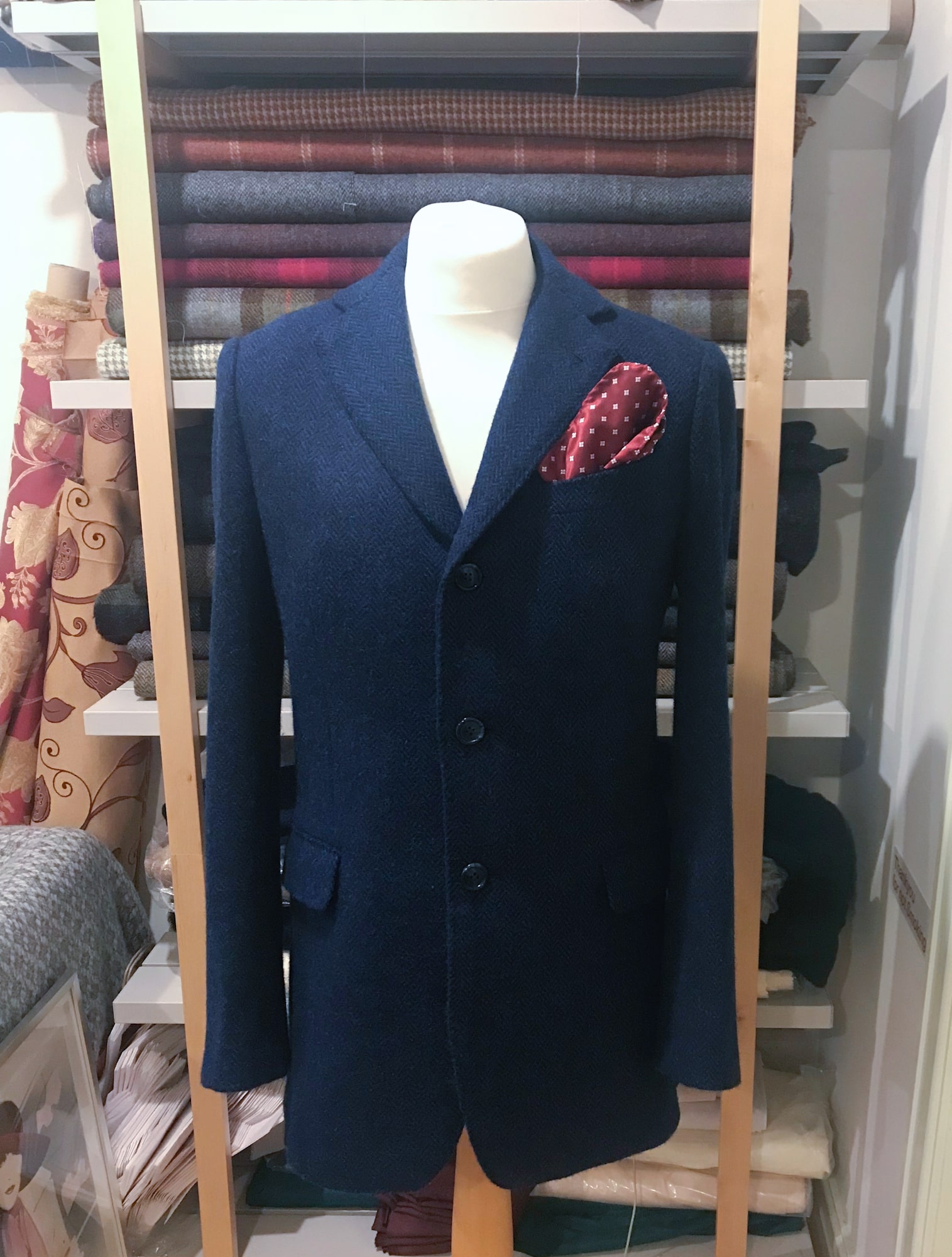 A dark blue suit on a mannequin